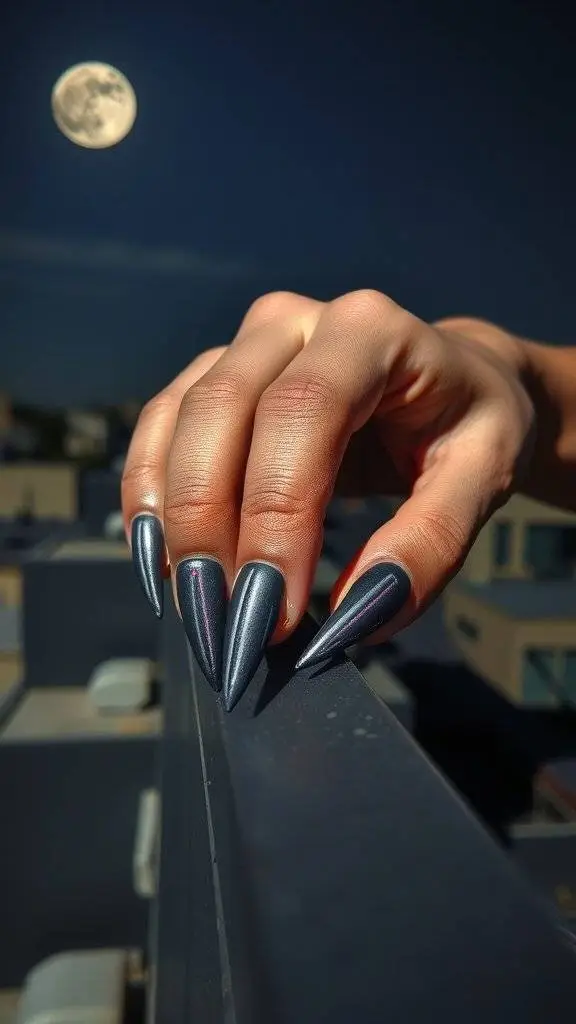 A hand with long, glossy black nails against a dark night sky with a full moon.