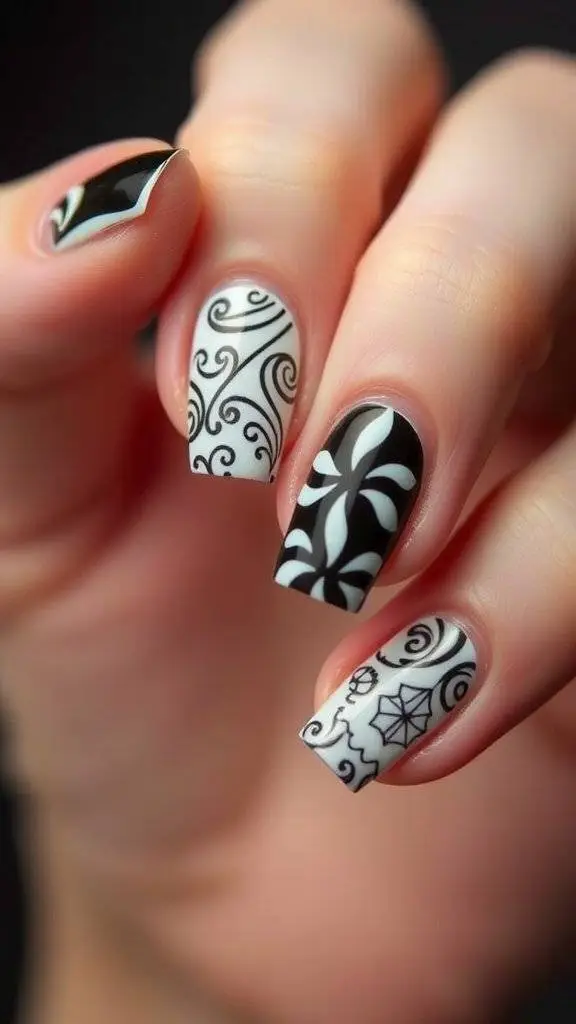 Close-up of hands with black and white retro-inspired nail art featuring various intricate designs.