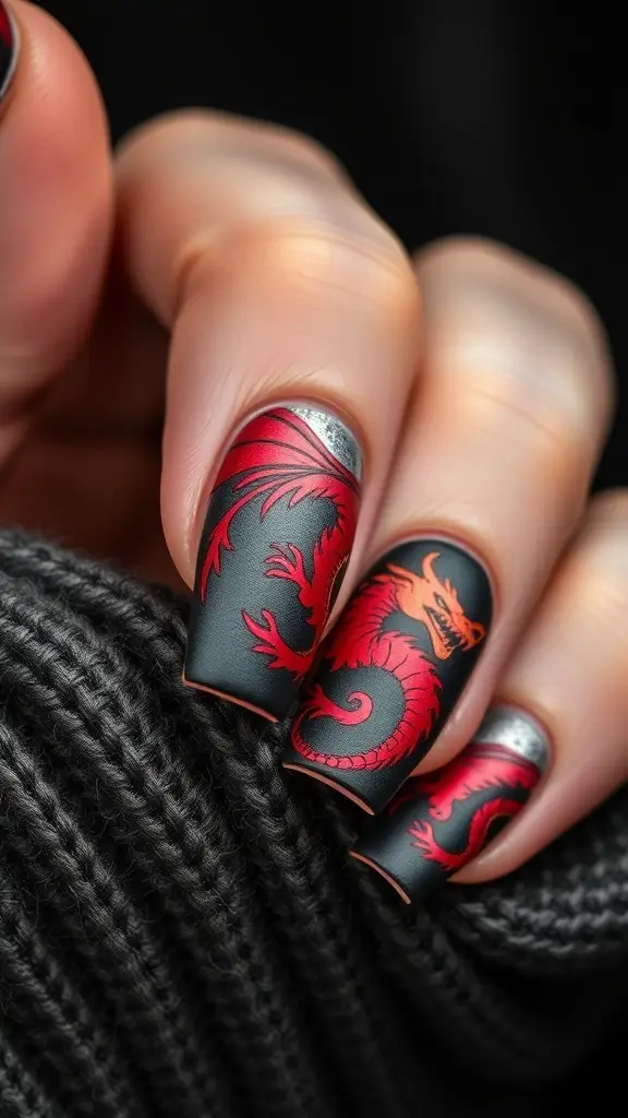 Nail art featuring Targaryen dragon designs in red and black colors