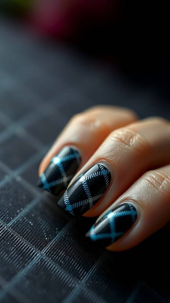 Nail art featuring black and metallic blue plaid patterns on long nails.